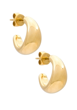 EF COLLECTION Jumbo Dome Hoop Earrings in Metallic Gold.