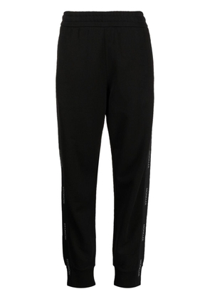 Moncler logo-tape cotton track pants - Black