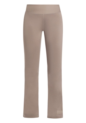 THE GIVING MOVEMENT high-rise bootcut leggings - Brown