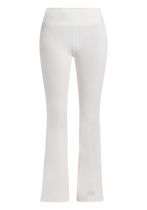 THE GIVING MOVEMENT high-waist bootcut leggings - White