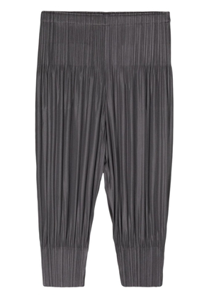 Pleats Please Issey Miyake pleated cropped trousers - Grey