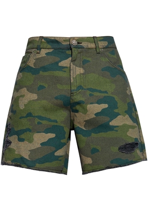Balmain camouflage print distressed shorts - Green