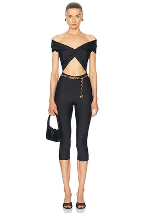 The Andamane Kendall Summer Off Shoulder Sleeveless Capri Jumpsuit in Black - Black. Size L (also in M, S, XS).