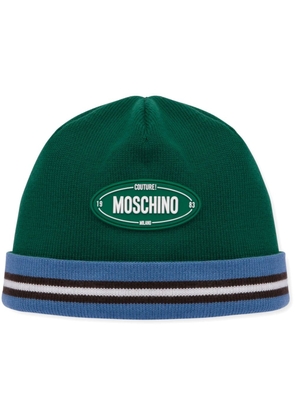 Moschino logo-appliqué virgin wool beanie - Green