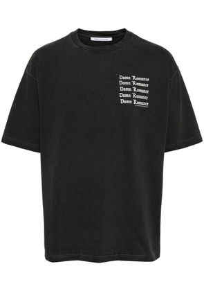 Children Of The Discordance slogan-print cotton T-shirt - Black