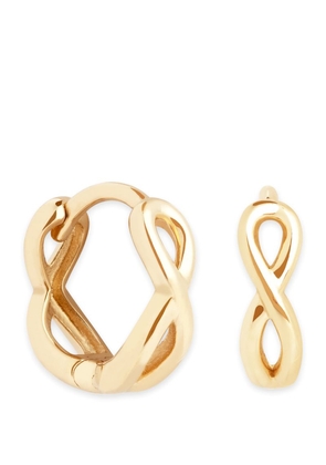 Astrid & Miyu Yellow Gold Infinity Huggie Earrings