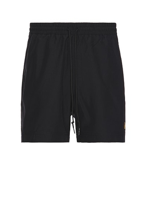 Carhartt WIP Chase Swim Trunks in Black & Gold - Black. Size L (also in M, S, XL/1X).
