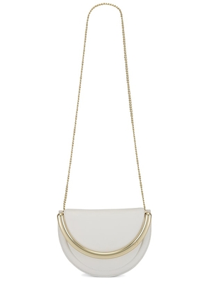 Aje Norma Crescent Clutch in Ivory.