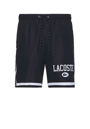 Lacoste Adjustable Swim Short in Black. Size M, S, XL/1X.