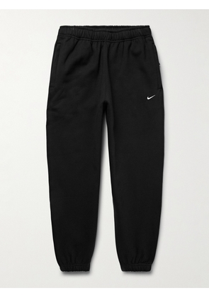 Nike - Solo Swoosh Tapered Logo-Embroidered Cotton-Blend Jersey Sweatpants - Men - Black - XS