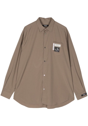 Undercover logo-appliqué long-sleeved shirt - Brown