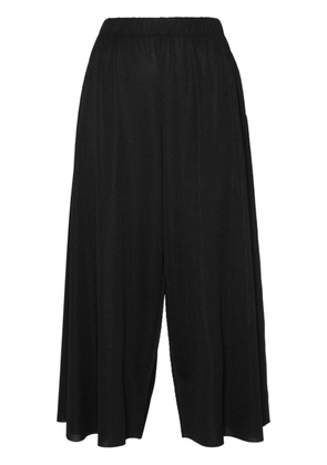 Pleats Please Issey Miyake A-POC cropped trousers - Black