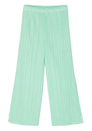 Pleats Please Issey Miyake pleated cropped trousers - Green