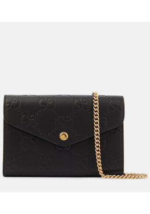 Gucci GG debossed leather wallet on chain