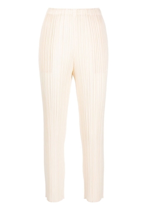 Pleats Please Issey Miyake pleated cropped trousers - Neutrals