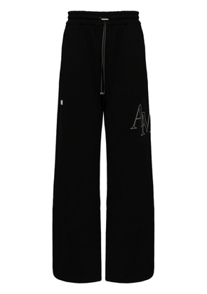 AMIRI logo-embroidered track pants - Black
