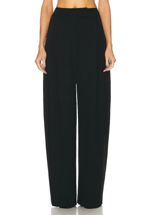 The Sei Baggy Pleat Trouser in Black - Black. Size 4 (also in ).