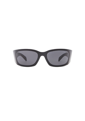Prada Wrap Sunglasses in Black.