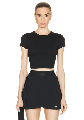 alo Soft Crop Finesse Short Sleeve Top in Black - Black. Size S (also in L, M, XS).