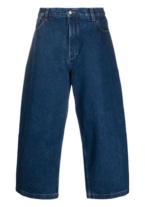 Studio Nicholson cropped wide-leg jeans - Blue