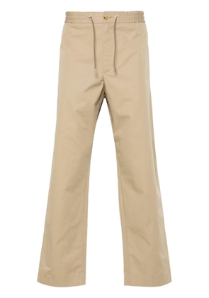 Moncler appliqué-logo cotton tapered trousers - Neutrals