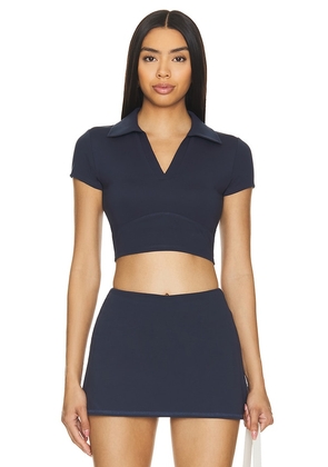 WellBeing + BeingWell MoveWell Frankie Polo Top in Navy. Size M, S, XL, XS, XXS.