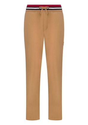 Moschino logo-appliqué straight-leg trousers - Brown