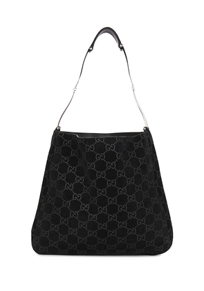FWRD Renew Gucci Monogram Suede Hobo Shoulder Bag in Black.