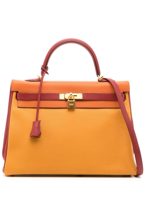 Hermès Pre-Owned 2014 pre-owned Kelly 35 Sellier two-way handbag - Orange