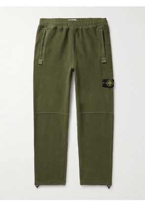 Stone Island - Tapered Logo-Appliquéd Garment-Dyed Cotton-Blend Fleece Sweatpants - Men - Green - S
