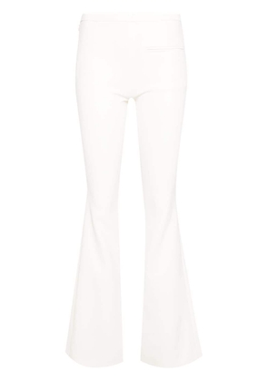 Courrèges Heritage low-rise bootcut trousers - White