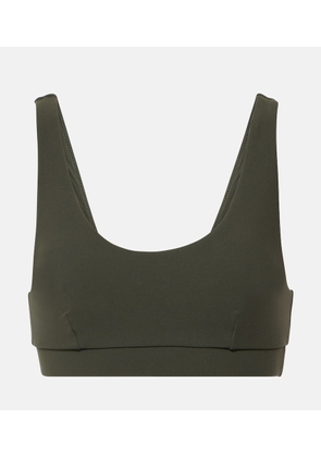 The Upside Peached Daisy logo sports bra