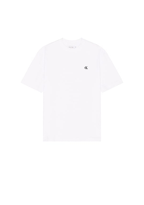 Calvin Klein Short Sleeve Relaxed Archive Logo Tee in White. Size S, XS.