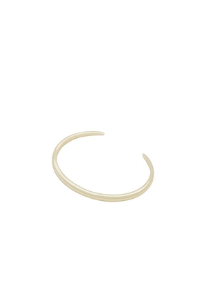 SHASHI Talia Bracelet Cuff in Metallic Gold.