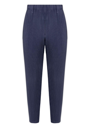 Homme Plissé Issey Miyake plissé tapered trousers - Blue
