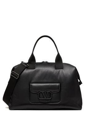 Valentino Garavani logo-debossed travel bag - Black