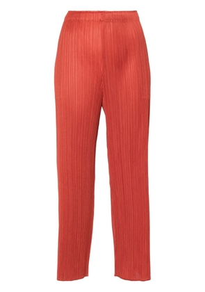 Pleats Please Issey Miyake Monthly Colors: April straight-leg trousers - Orange