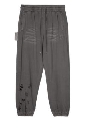 Musium Div. distressed cotton track pants - Grey