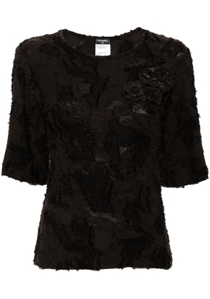 CHANEL Pre-Owned Camellia-appliqué jacquard blouse - Black