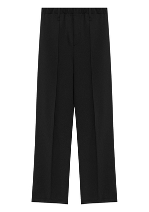 Issey Miyake long-leg trousers - Black
