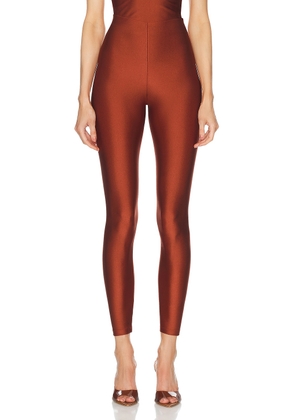 The Andamane Holly 80's Legging in Intense Rust - Rust. Size M (also in S, XS).