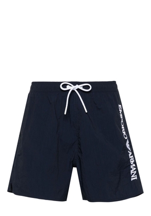Emporio Armani logo-embroidered swim shorts - Blue