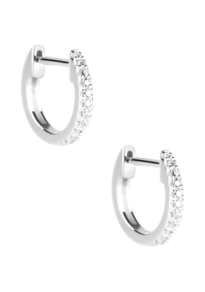 STONE AND STRAND Diamond Pave Huggie Earrings in White Gold & Diamond - Metallic Silver. Size all.