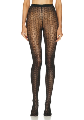 Wolford X Simkhai Sheer Pattern Tight in Black - Black. Size XS (also in ).