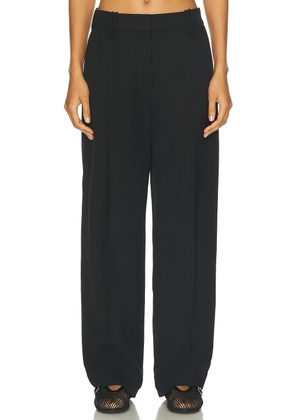 Ganni Pleated Pant in Black - Black. Size 32 (also in 34, 36, 40).