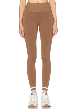 THE UPSIDE Form Seamless 25 in Midi Pant in Brown - Brown. Size L (also in M, S, XS).
