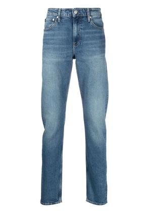 Calvin Klein Jeans logo-patch slim-cut jeans - Blue