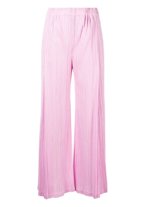 Pleats Please Issey Miyake September plissé-effect cropped trousers - Pink