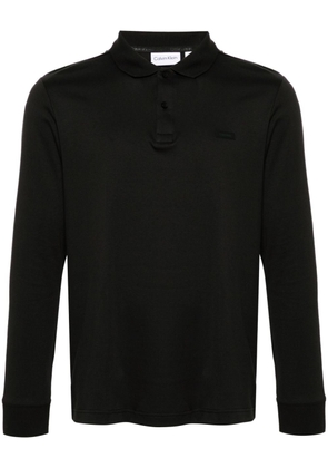 Calvin Klein logo-patch cotton polo shirt - Black