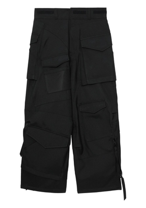 Junya Watanabe MAN strap-detail asymmetric cargo trousers - Black